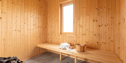 Hüttendorf - Wellnessbereich: in Chalets - Roitham bei Stein an der Traun - großzügige Sauna - Ferienresort Inzell by ALPS RESORTS