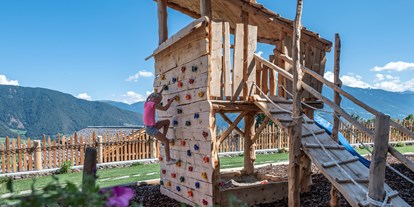 Hüttendorf - zustellbares Kinderbett - Hafling - Spielplatz - Dilia Dolomites