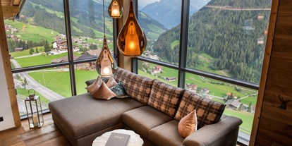 Hüttendorf - Massagen: im Hauptgebäude - Polling in Tirol - Chalet Alpenrose 1. Stock Ausblick - Chalets Alpenjuwel