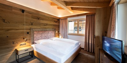 Hüttendorf - zustellbares Kinderbett - Kapfing - Chalet Alpenrose 1. Stock Schlafzimmer - Chalets Alpenjuwel