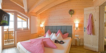 Hüttendorf - zustellbares Kinderbett - Hippach-Schwendberg - Romantik-Chalet Waldschlössl - Ferienhütten Tirol