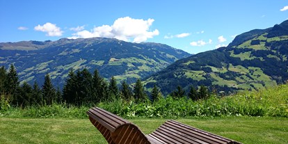Hüttendorf - Whirlpool: beim Chalet - Going am Wilden Kaiser - Alpenchalet Bergkristall - Ferienhütten Tirol
