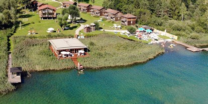 Hüttendorf - Frühstück: Brotservice - PLZ 9852 (Österreich) - Das Lake Resort befindet sich direkt am Pressegger See! - Lake Resort Pressegger See