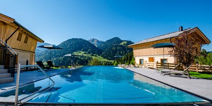Hüttendorf - Sauna: im Hauptgebäude - PLZ 6274 (Österreich) - Infinity-Pool - Beim Hochfilzer-Hotel & Premium Chalets ****s