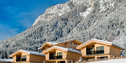 Hüttendorf - Typ: Luxuschalet - Winteransicht Aussen - Beim Hochfilzer-Hotel & Premium Chalets ****s