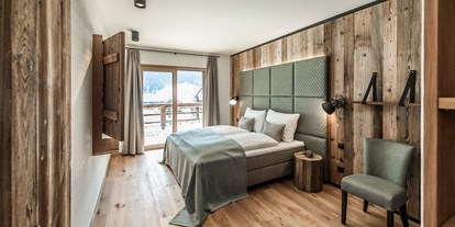 Hüttendorf - Doppelbett - Österreich - Alle Schlafzimmer im ersten Stock mit Seeblick - Im Franzerl am Weissensee