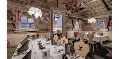 Hüttendorf - Schwerpunkt: Romantikurlaub - Kimleinsdorf - INNs HOLZ Chaletdorf Restaurant im INNs HOLZ Herzerlalm - INNs HOLZ Chaletdorf
