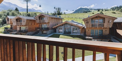 Hüttendorf - Umgebungsschwerpunkt: am Land - Kirchberg in Tirol - Außenansicht unsere Chalets - Bergdorf Hotel Zaglgut Ski In & Ski Out