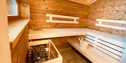 Hüttendorf - Rauchen: nur im Freien erlaubt - PLZ 4794 (Österreich) - Sauna von Innen - Bergbauernchalets 