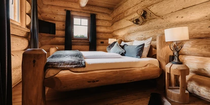 Hüttendorf - Umgebungsschwerpunkt: am Land - Großgmain - Schlafzimmer Wild Moose - WoodRidge Luxury Chalets