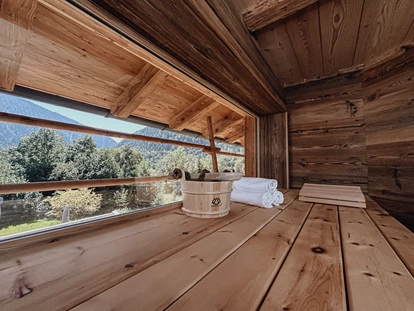 Hüttendorf - Doppelbett - Ried im Zillertal - Chalets Bayrischzell mit privatem Hottub und Sauna