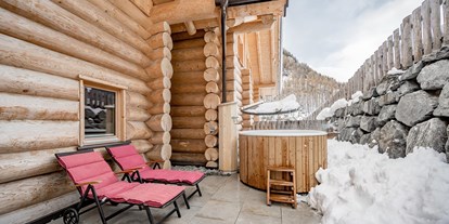 Hüttendorf - Balkon - Skigebiet Sölden - Hot Tub in den Chalets - Chalet Resort Sölden