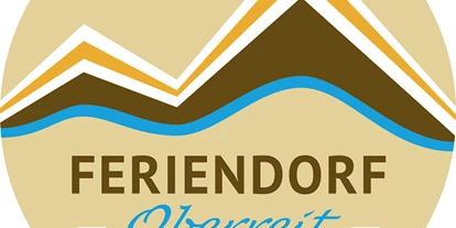 Hüttendorf - Sonnenterrasse - Walserberg - Logo - Feriendorf Oberreit