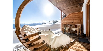 Hüttendorf - Schwerpunkt: Winterurlaub - Trentino-Südtirol - Terrasse - STERN MOUNTAIN CHALETS ****
