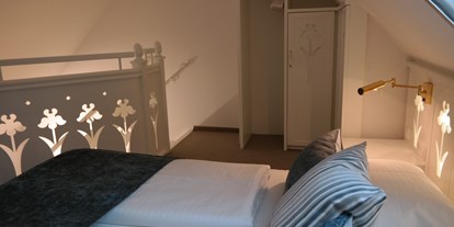 Hüttendorf - Schwerpunkt: Urlaub mit Hund - Pamhagen - Bungalow A1, Schlafzimmer im 1.Stock - VILA VITA Pannonia