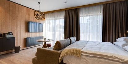 Hüttendorf - Doppelbett - Golling - Panorama Suite - Hideaway Hotel Montestyria Chalets & Suiten