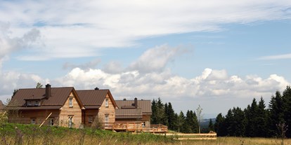Hüttendorf - Typ: Lodge - Torfhaus Harzresort im Sommer - Torfhaus HARZRESORT