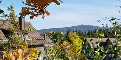 Hüttendorf - Doppelbett - Uehrde - Torfhaus Harzresort im Herbst  - Torfhaus HARZRESORT