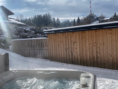 Hüttendorf - Skiraum: im Chalet - Whirlpool  - PfänderGlück Ferienhäuser