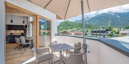 Hüttendorf - Frühstück: Frühstück im Hauptgebäude - Seefeld in Tirol - AlpenParks Chalet & Apartment Alpina Seefeld