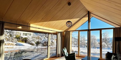 Hüttendorf - Typ: Bergchalet - Wölting - Wohnzimmer Winter - Luxus Chalet Annelies