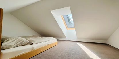 Hüttendorf - Alleinlage - Stainach - Das Chalet verfügt über 1 Schlafzimmer und ein Dachgeschoss Zimmer für 2 Kinder bis 10 Jahre. - Luxus Chalet Annelies