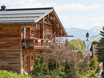Hüttendorf - Sauna: im Chalet - Rückholz - Außenansicht Chalet im Sommer - Chalet F