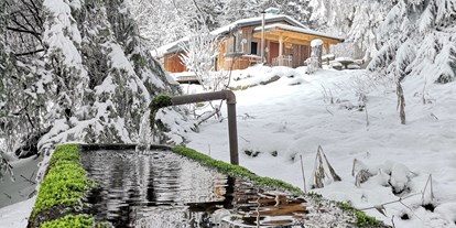 Hüttendorf - Typ: Luxuschalet - Chalet HERZblatt im Winter - Traumhütten für Zwoa