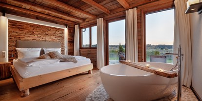 Hüttendorf - Typ: Blockhütte - Steinheim am Albuch - Romantik und Entspannung pur mit Badewanne und Kamin im Schlafbereich - Widmann´s Alb.leben