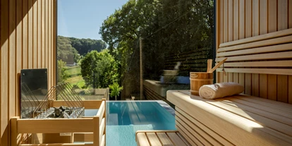 Hüttendorf - Typ: Lodge - Kothvogel - Sauna mit Panorama-Glas --> Sauna mit traumhaften Ausblick - Julianhof - Premium Guesthouse & Spa