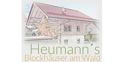 Hüttendorf - Fahrradgarage: im Hauptgebäude - Heßdorf - Logo - Heumanns Blockhäuser am Wald