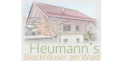 Hüttendorf - Fahrradgarage: im Hauptgebäude - Weismain - Logo - Heumanns Blockhäuser am Wald