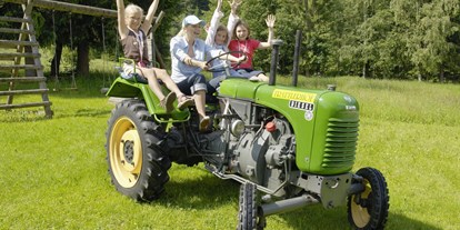 Hüttendorf - Typ: Luxuschalet - GUTshof-Erlebnisse - Oldtimer Traktoren Ausfahrten - Trattlers Hof-Chalets
