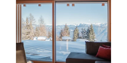 Hüttendorf - Einzelbett - Trentino-Südtirol - Panoramafenster Wohnzimmer - Chalets Sissi