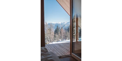 Hüttendorf - Einzelbett - Trentino-Südtirol - Blick aus dem Schlafzimmer  - Chalets Sissi