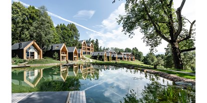 Hüttendorf - Pools: Infinity Pool - Riffian bei Meran - ADLER Lodge RITTEN lake  - ADLER Lodge RITTEN