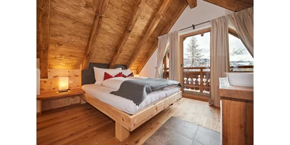 Hüttendorf - Schwerpunkt: Winterurlaub - Au (Hallein) - Schlafzimmer Dachboden mit Dusche und WC - Almidylle 