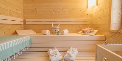 Hüttendorf - Massagen: im Chalet - PLZ 8992 (Österreich) - alle Chalets verfügen über eine Sauna - Narzissendorf Zloam