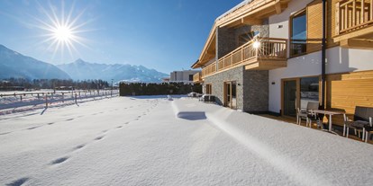 Hüttendorf - offener Kamin - PLZ 5452 (Österreich) - AlpenParks Chalet & Apartment AreitXpress Zell am See