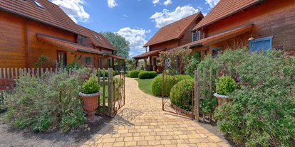 Hüttendorf - Schwerpunkt: Badeurlaub - Herzlich Willkommen - Ferienhäuser Aura