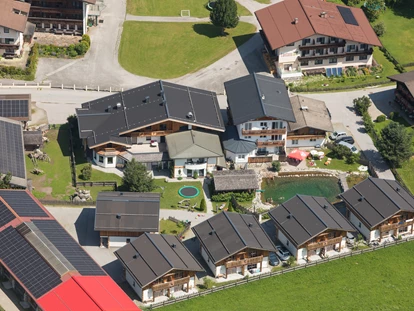 Hüttendorf - Snow Space Salzburg - Flachau - Wagrain - St. Johann - Hotel Sieglhub Areal mit Chalets, Hotel und Appartementhaus - Sieglhub Chalets Appartements Hotel