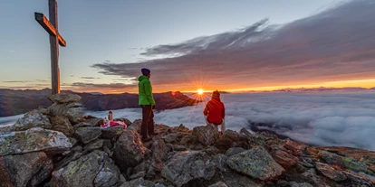 Hüttendorf - Chaletgröße: 8 - 10 Personen - Morgendliche Gipfelwanderung zum Naßfeldriegel samt Sonnenaufgang - Beim Rauter – Emberger Alm