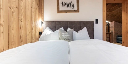 Hüttendorf - Pfunds - Schlafzimmer - Chalet Laudegg