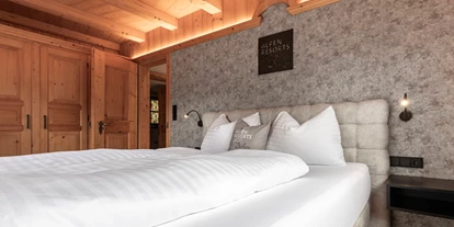 Hüttendorf - Pfunds - Schlafzimmer - Chalet Laudegg