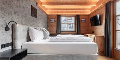 Hüttendorf - Pfunds - Schlafzimmer - Chalet Laudegg