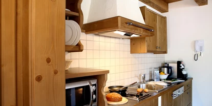 Hüttendorf - Fügenberg - Kochen für die Liebsten - Alpendorf Anno Dazumal