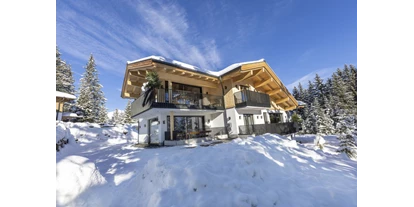 Hüttendorf - Chaletgröße: 4 - 6 Personen - Pinzgau - Herzlich Willkommen auf der Sam-Alm Snow&Bike in Hochkrimml 
Winter Aussen - Sam-Alm