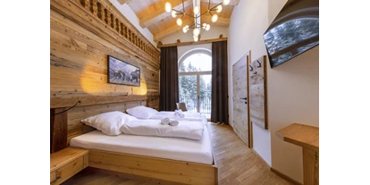 Hüttendorf - Chaletgröße: 4 - 6 Personen - Pinzgau - Masterbedroom Wohnung Top2 - Sam-Alm