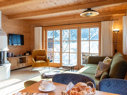 Hüttendorf - Whirlpool: beim Chalet - Wohnen/Essen Sonntagshorn/Unternberg - Chalets&Suiten Beim Waicher