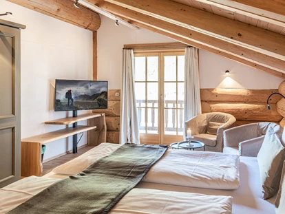 Hüttendorf - Whirlpool: beim Chalet - Naturstammhaus Schlafzimmer 1 - Chalets&Suiten Beim Waicher